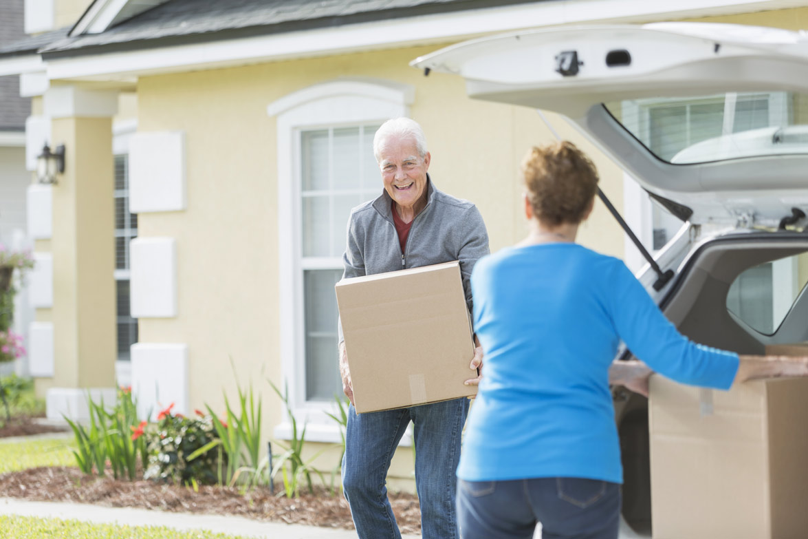 Older Couple Moving in House