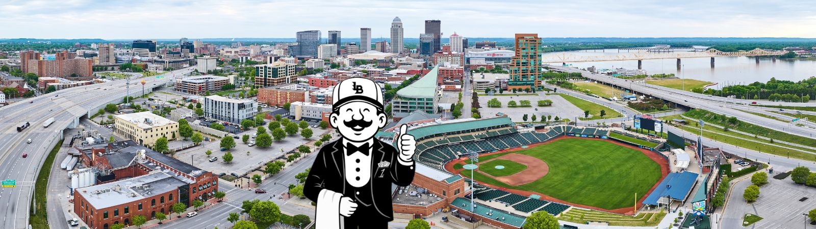 Harrison Banks, our Banking Butler, at the Louisville Slugger Field with their logo hat on.